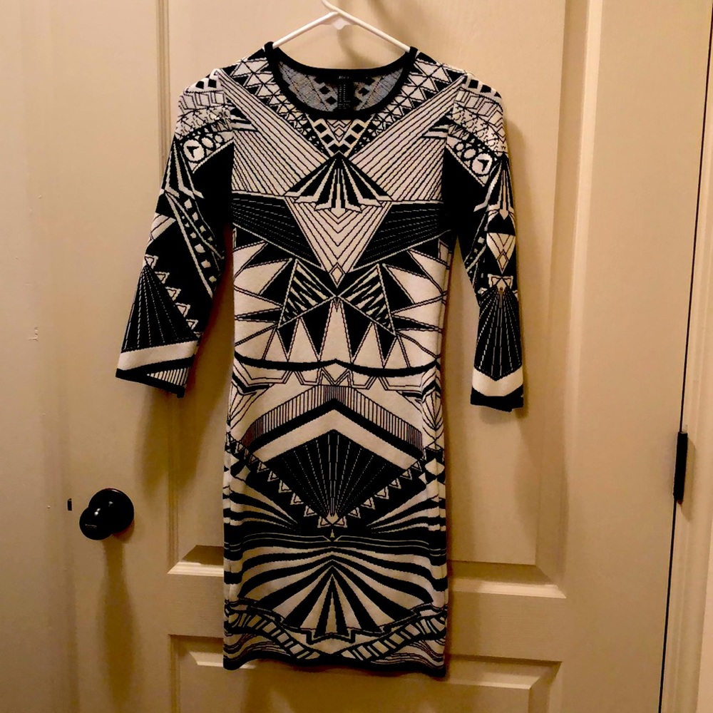Black and white sweater dress. Very form fitting! Size Med.